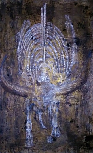 Squelette d'un auroch, ancêtre de la vache. Les os sont blancs, le fond est fait avec de la peinture et du bitume de judée